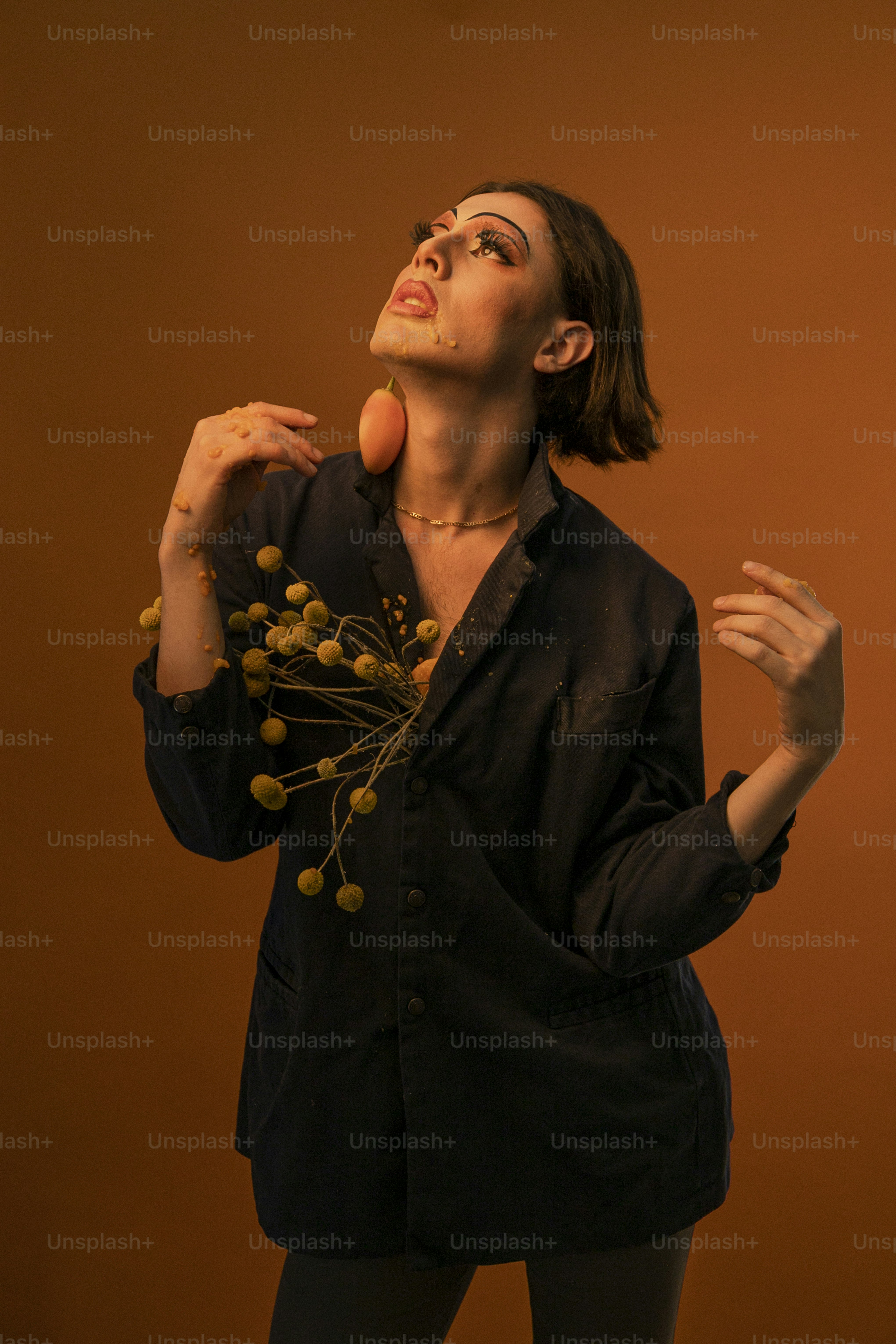 A woman holding a bunch of flowers in her hands photo – Portrait Image ...