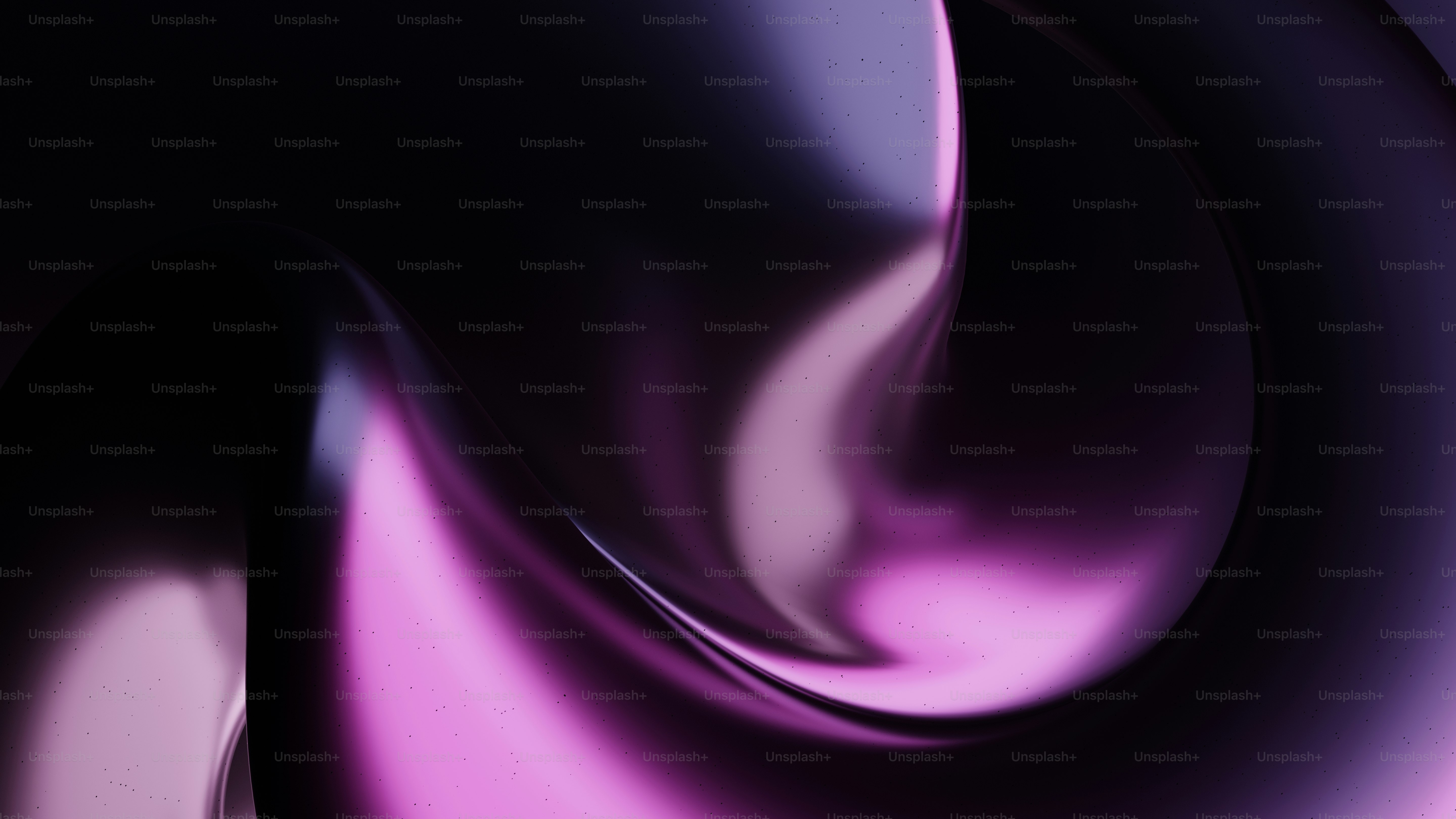 a close up of a purple and black background