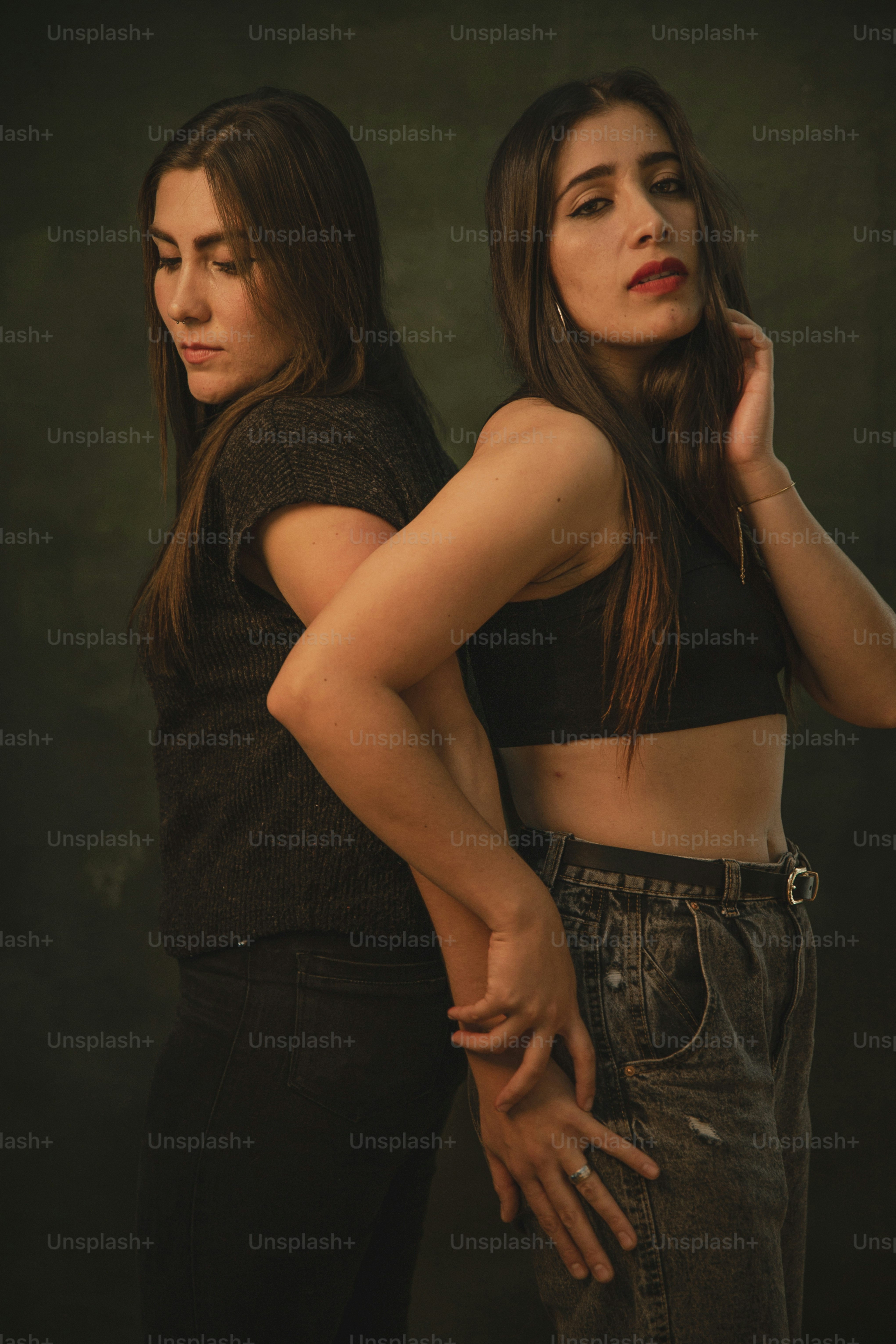 a couple of women standing next to each other