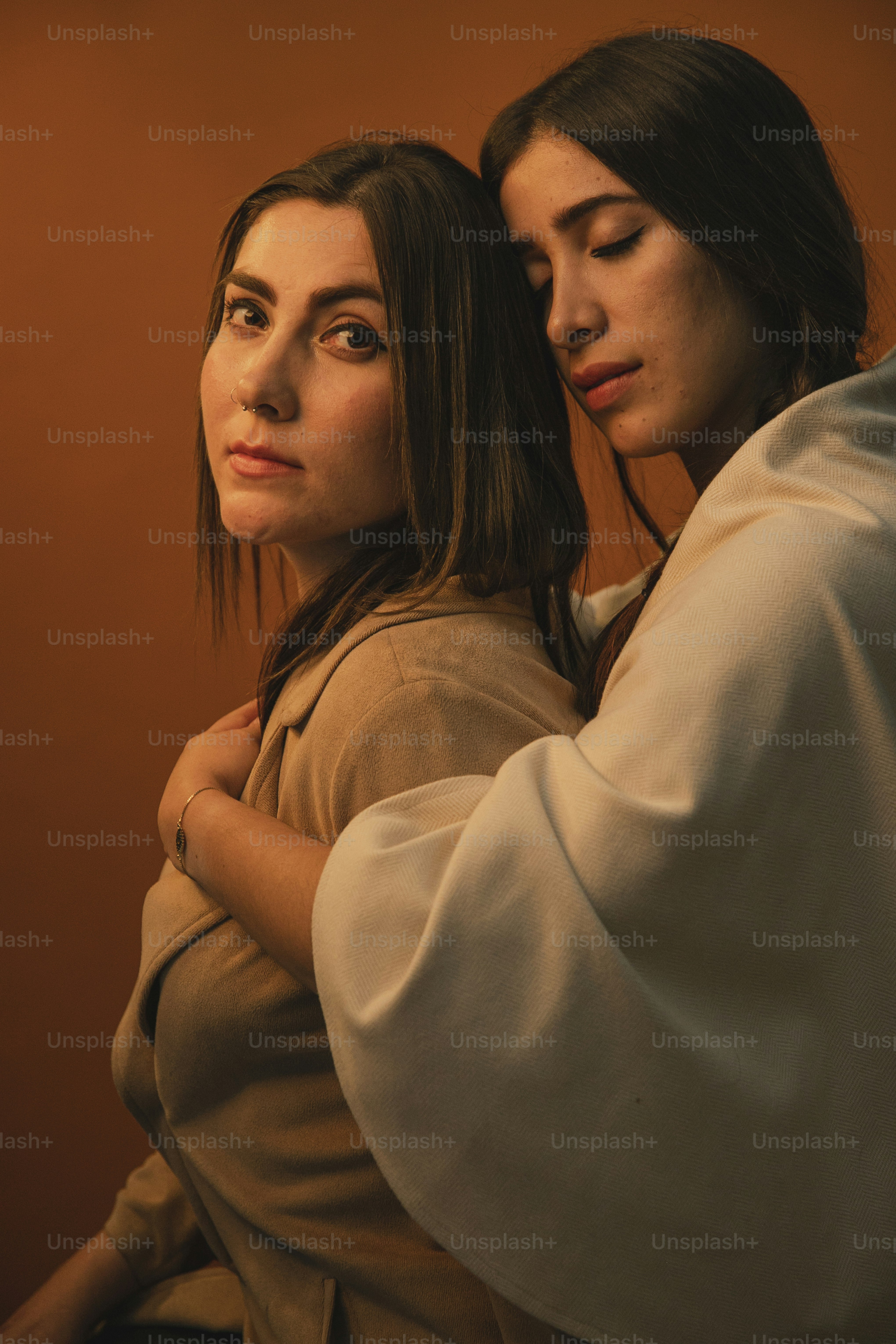 a couple of women standing next to each other