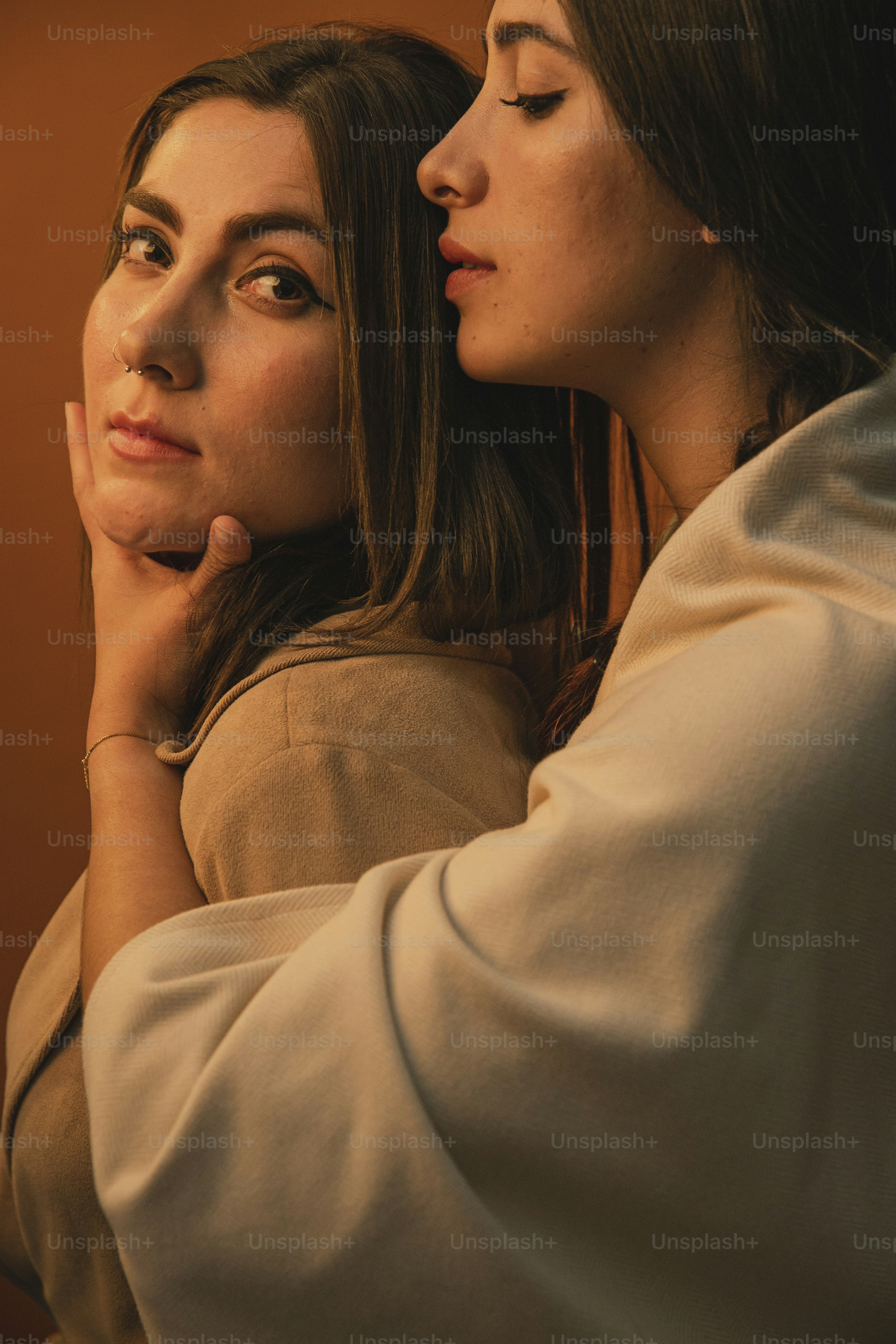 a couple of women standing next to each other