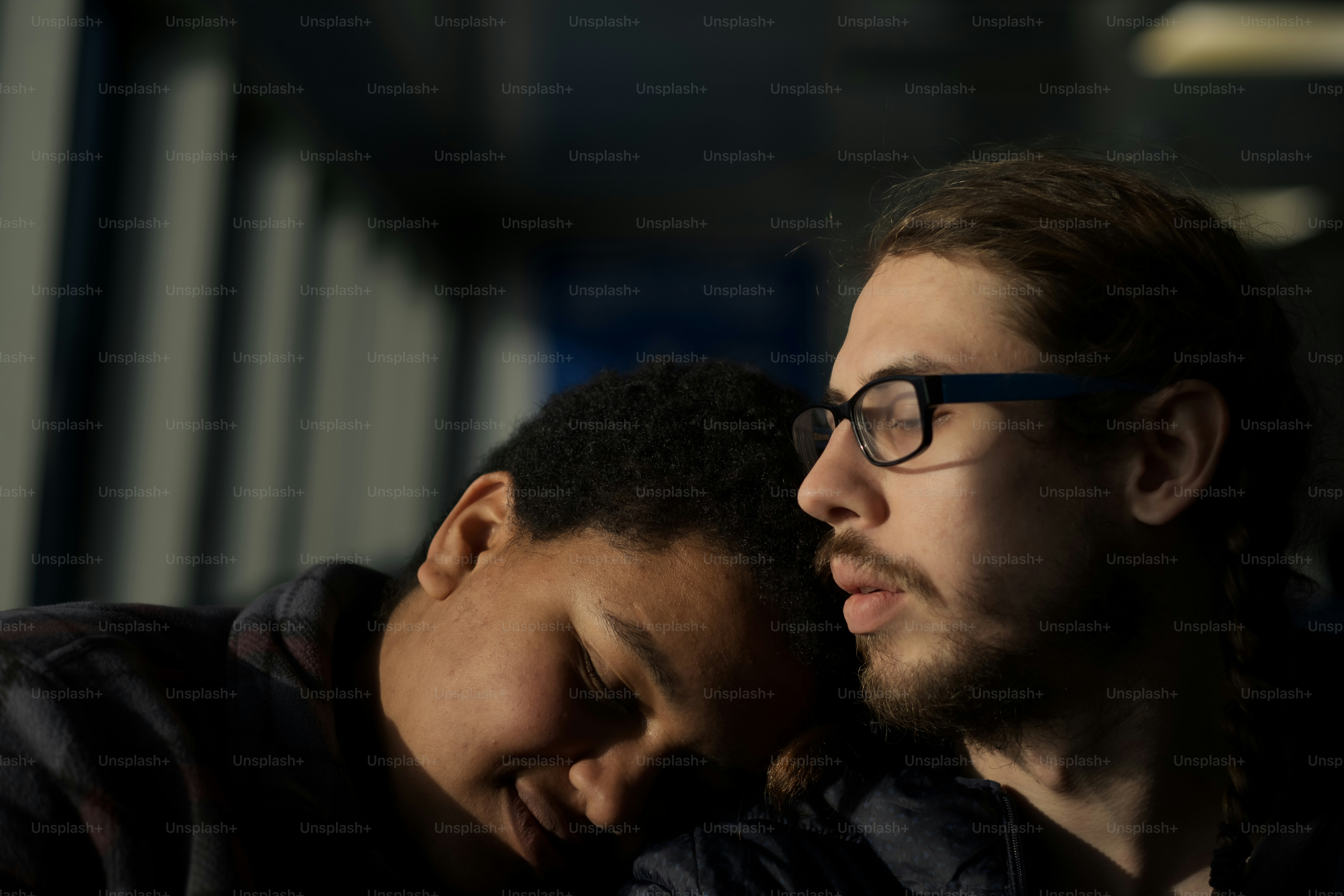 a man and a woman are staring at each other
