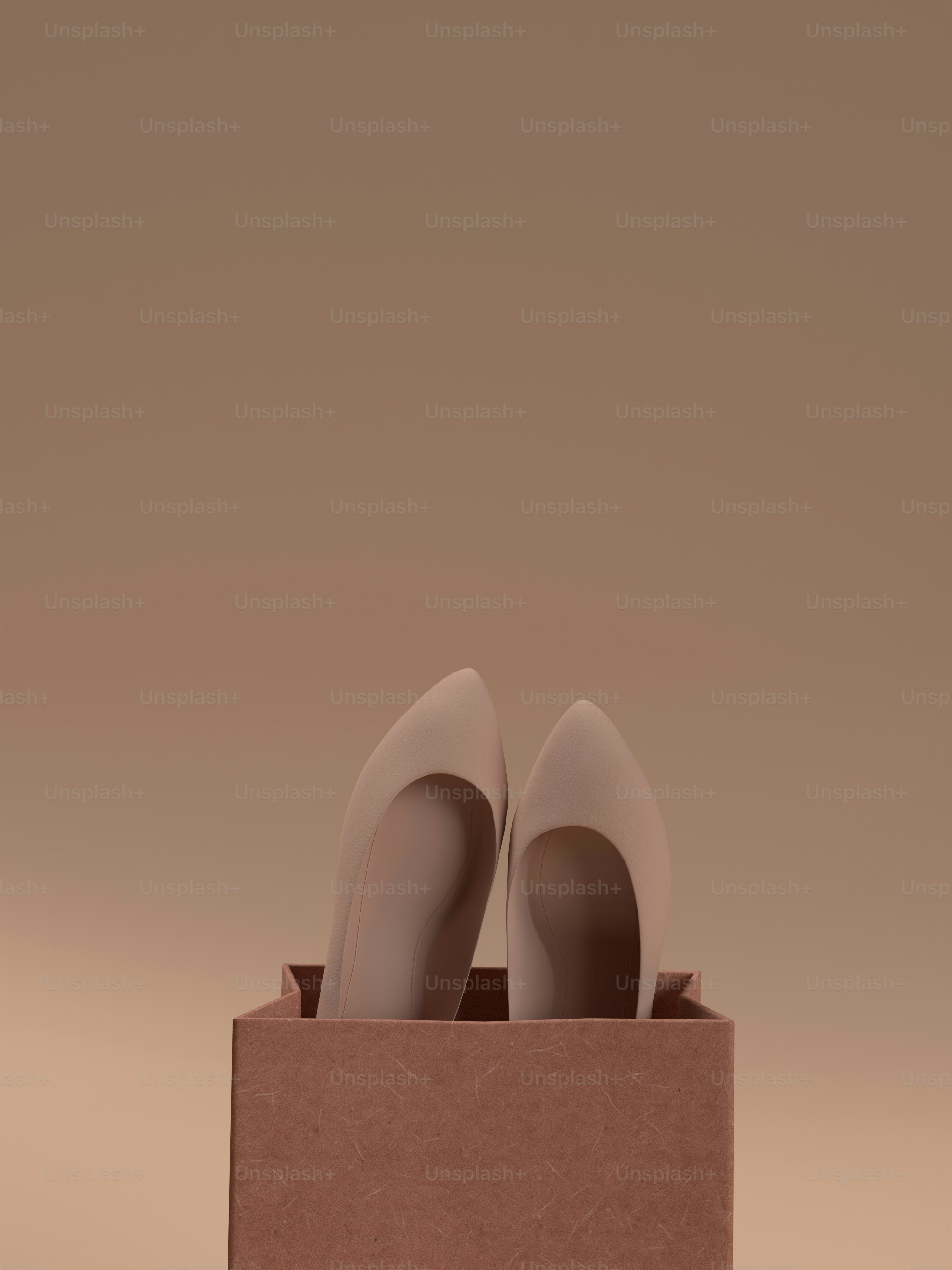 a pair of shoes sitting inside of a cardboard box