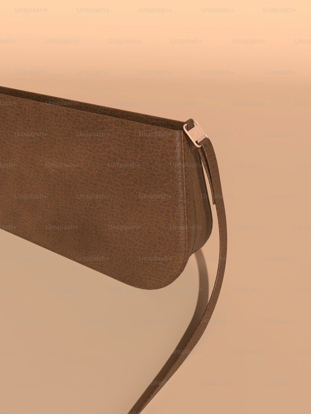 a brown purse with a long strap