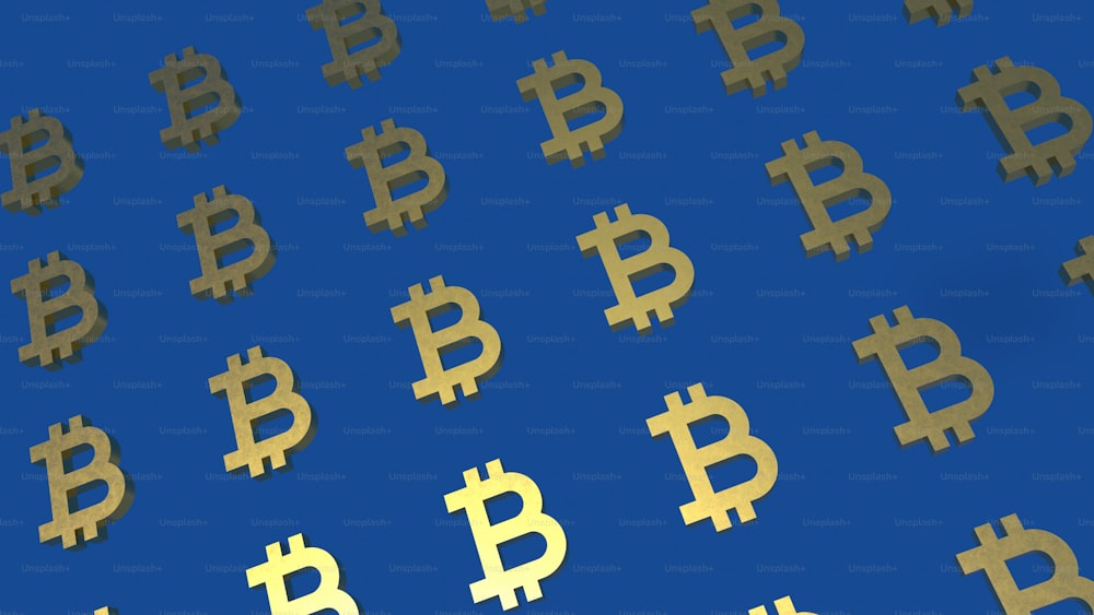 a group of golden bitcoins on a blue background