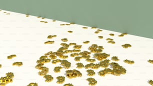Ein Strauß Goldnuggets auf weißer Oberfläche