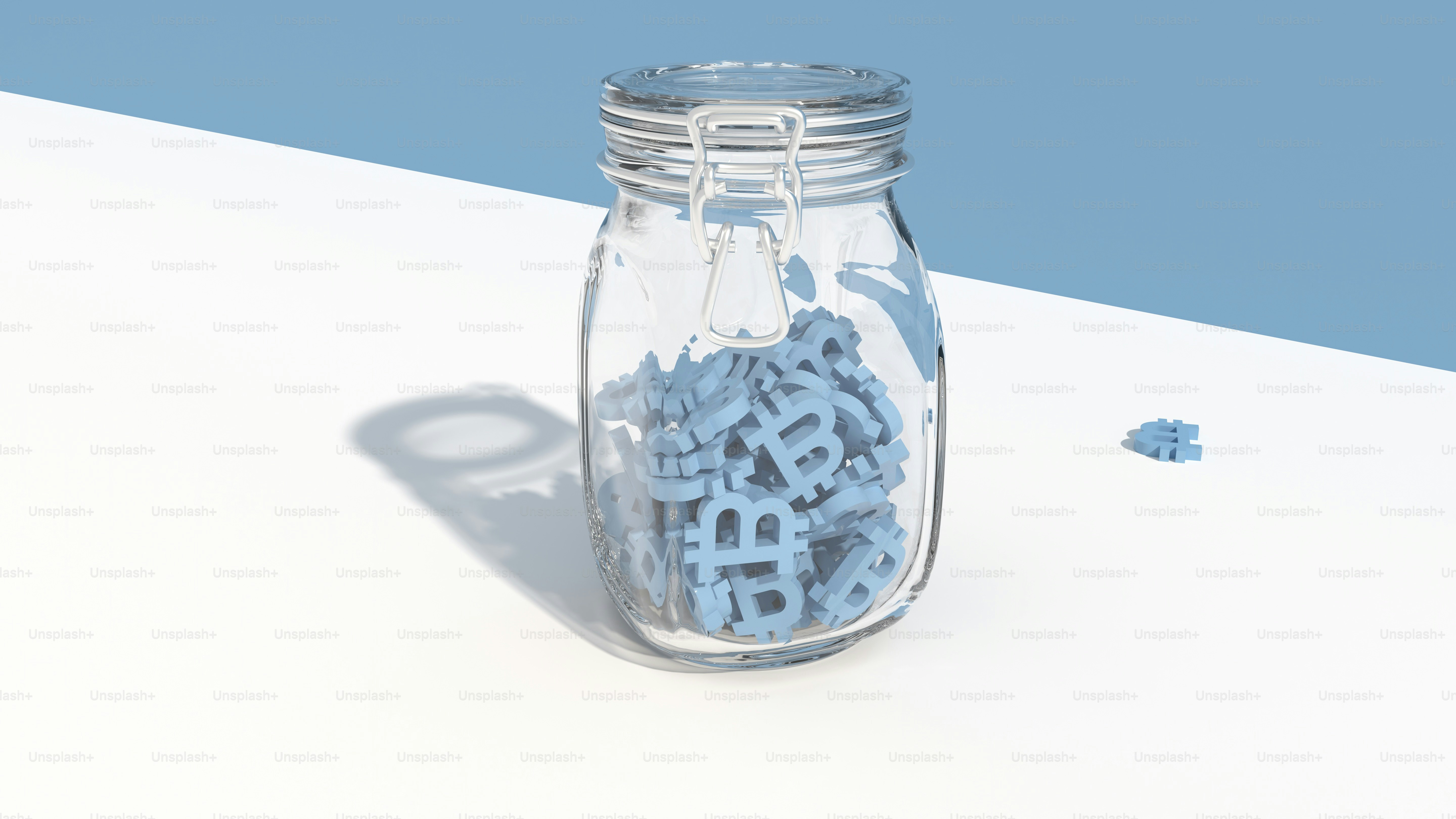 a jar filled with blue letters sitting on top of a table