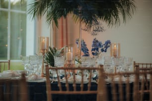 a dining room table is set for a formal dinner