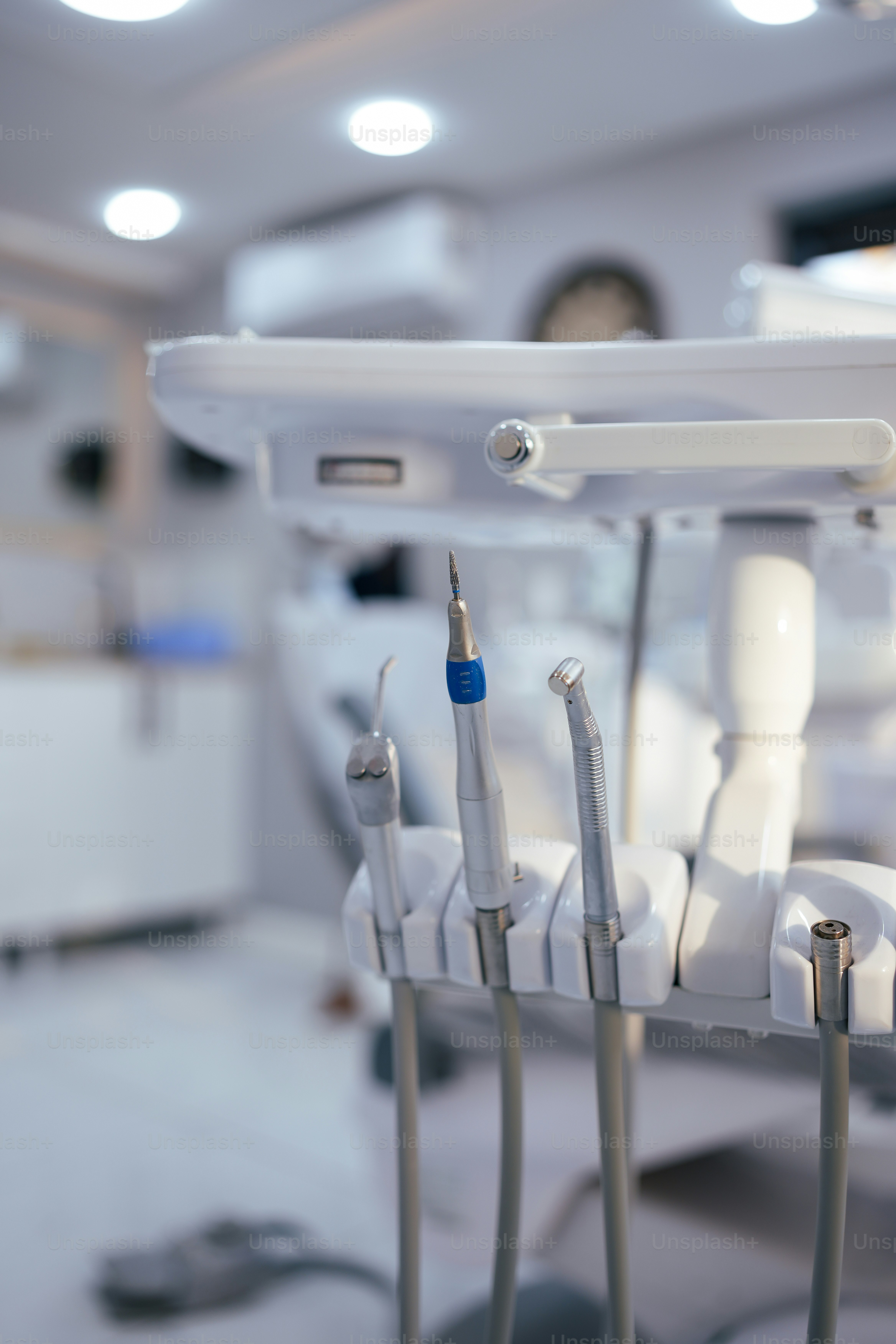 a group of dental instruments sitting on top of a table