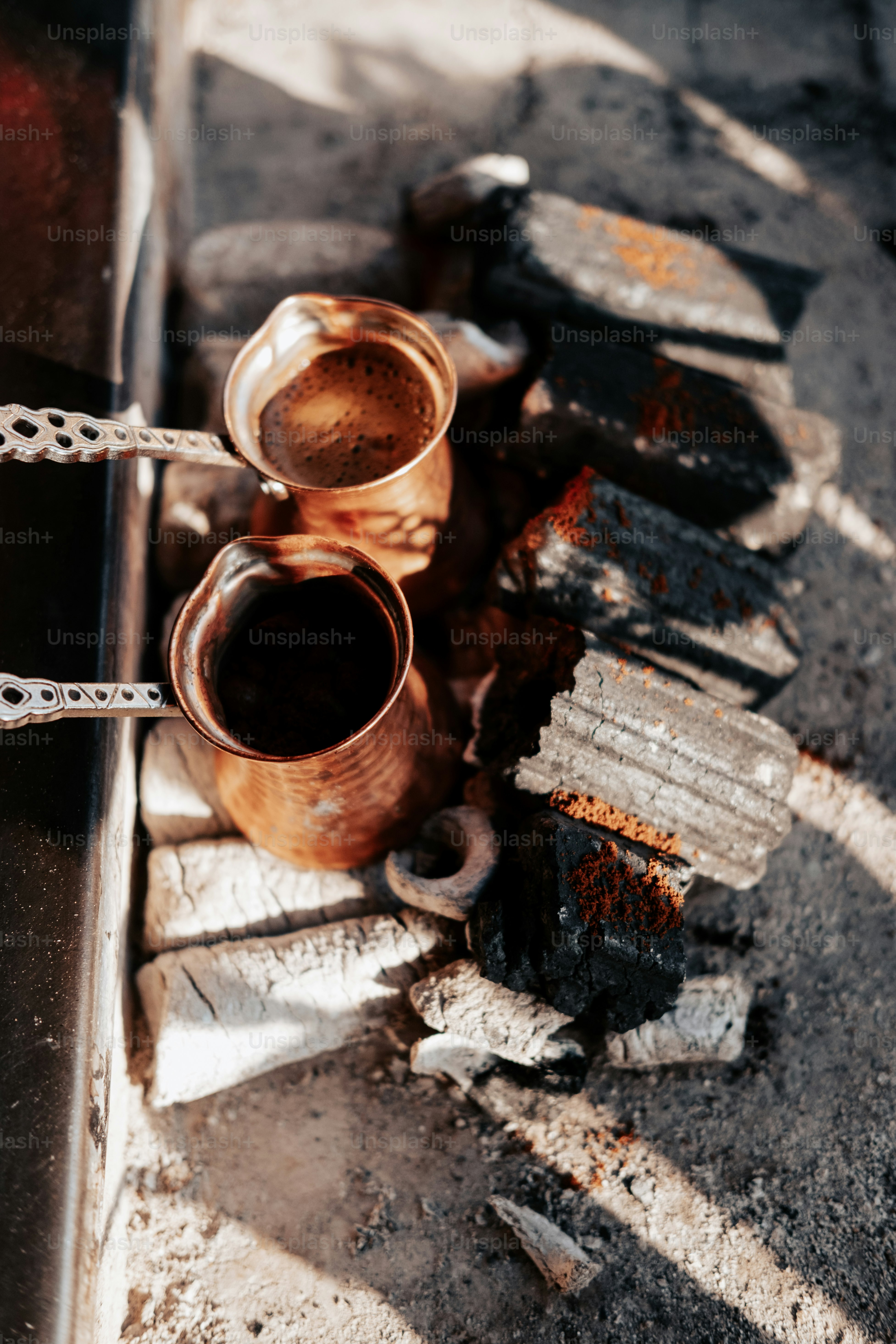a couple of cups sitting on top of a table