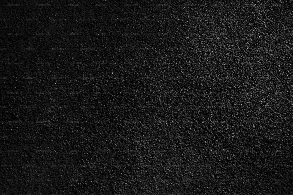 um close up de uma textura de tapete preto