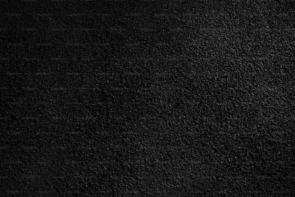 a close up of a black carpet texture