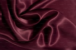 a close up view of a maroon fabric