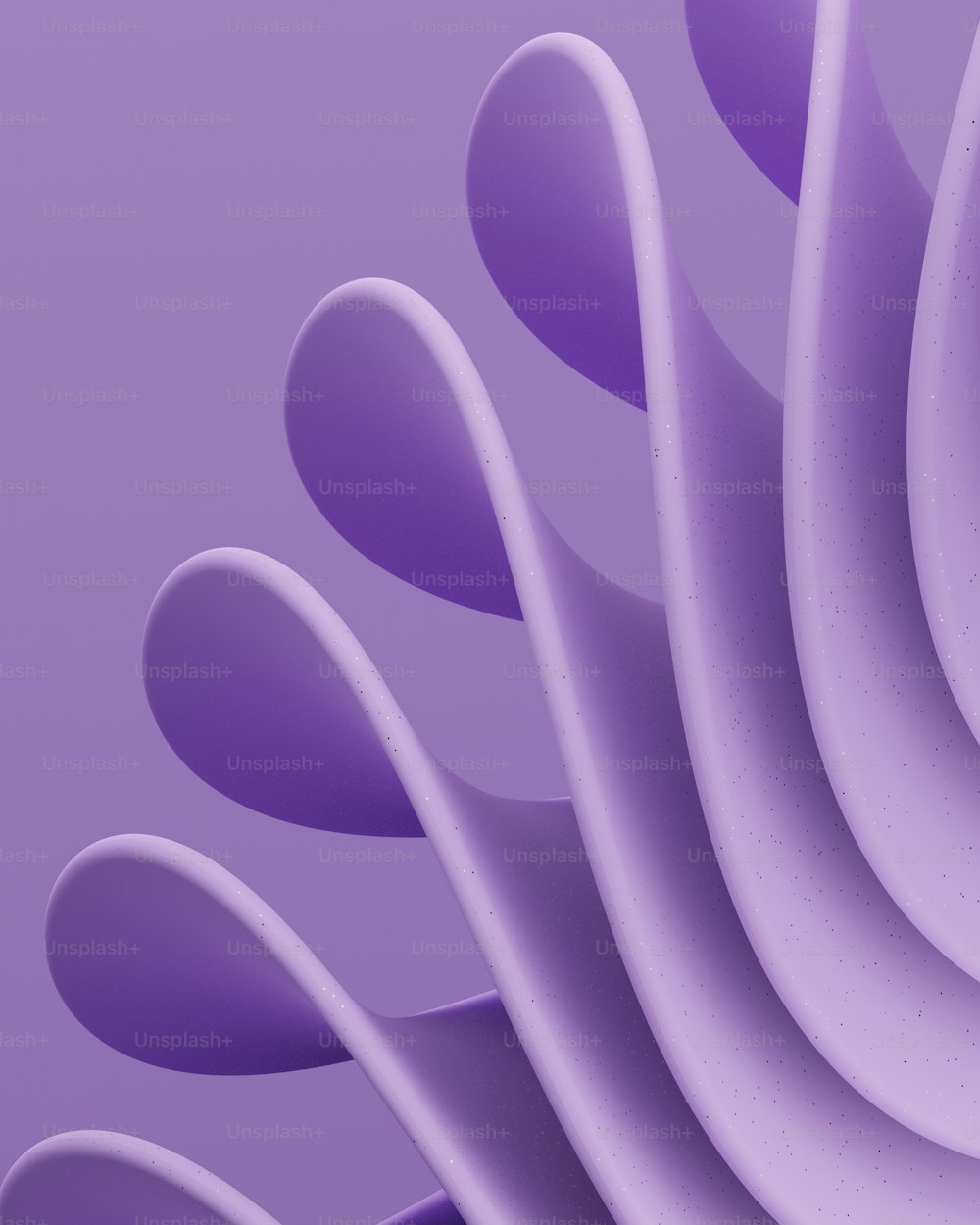 a purple abstract background with curved shapes