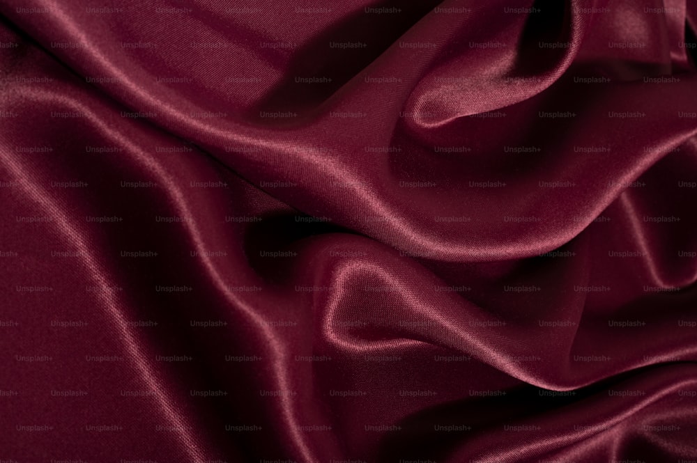 a close up view of a red fabric