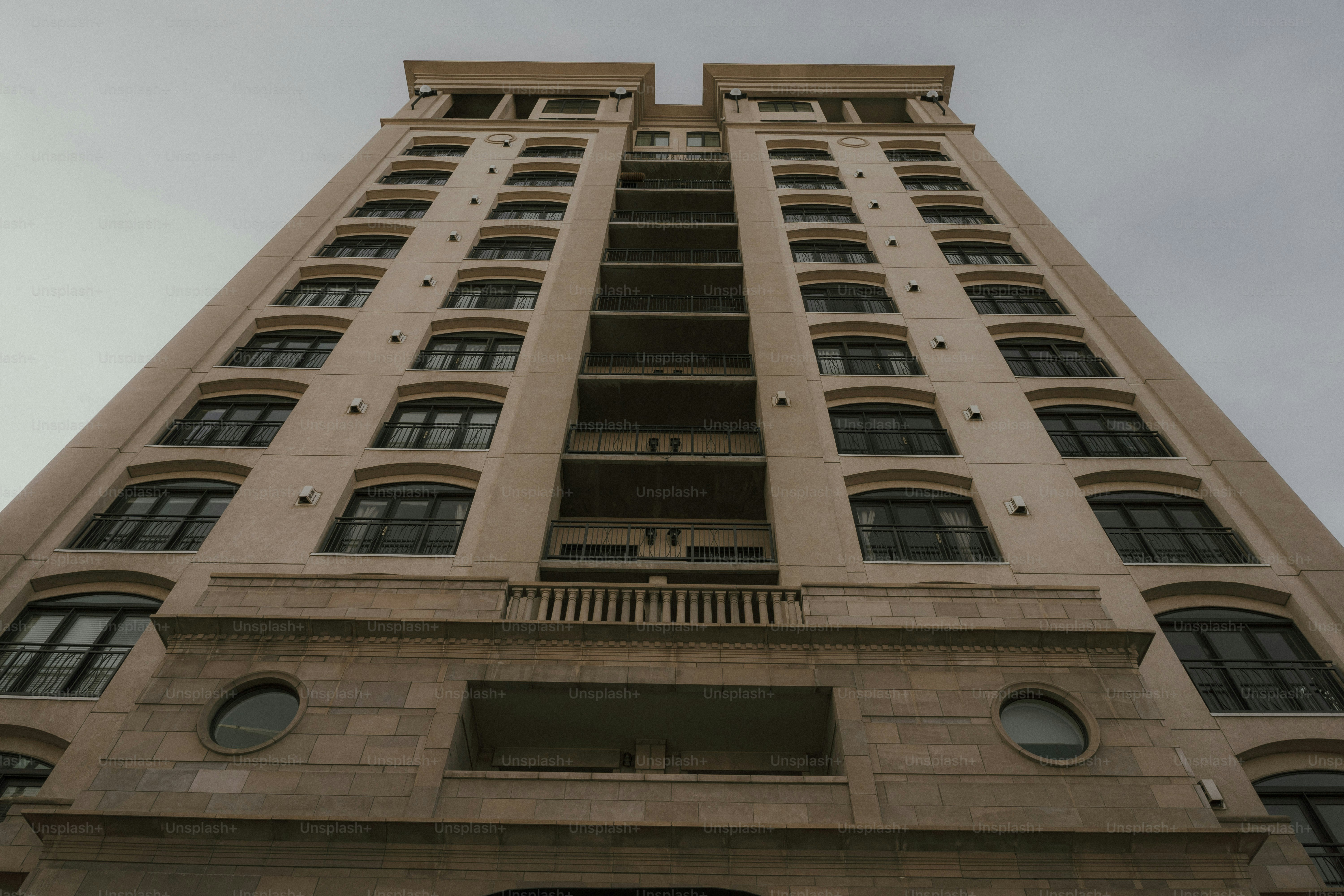 a tall building with a clock on the front of it