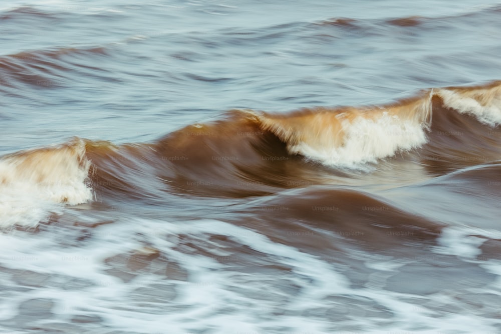 a close up of a wave in the ocean