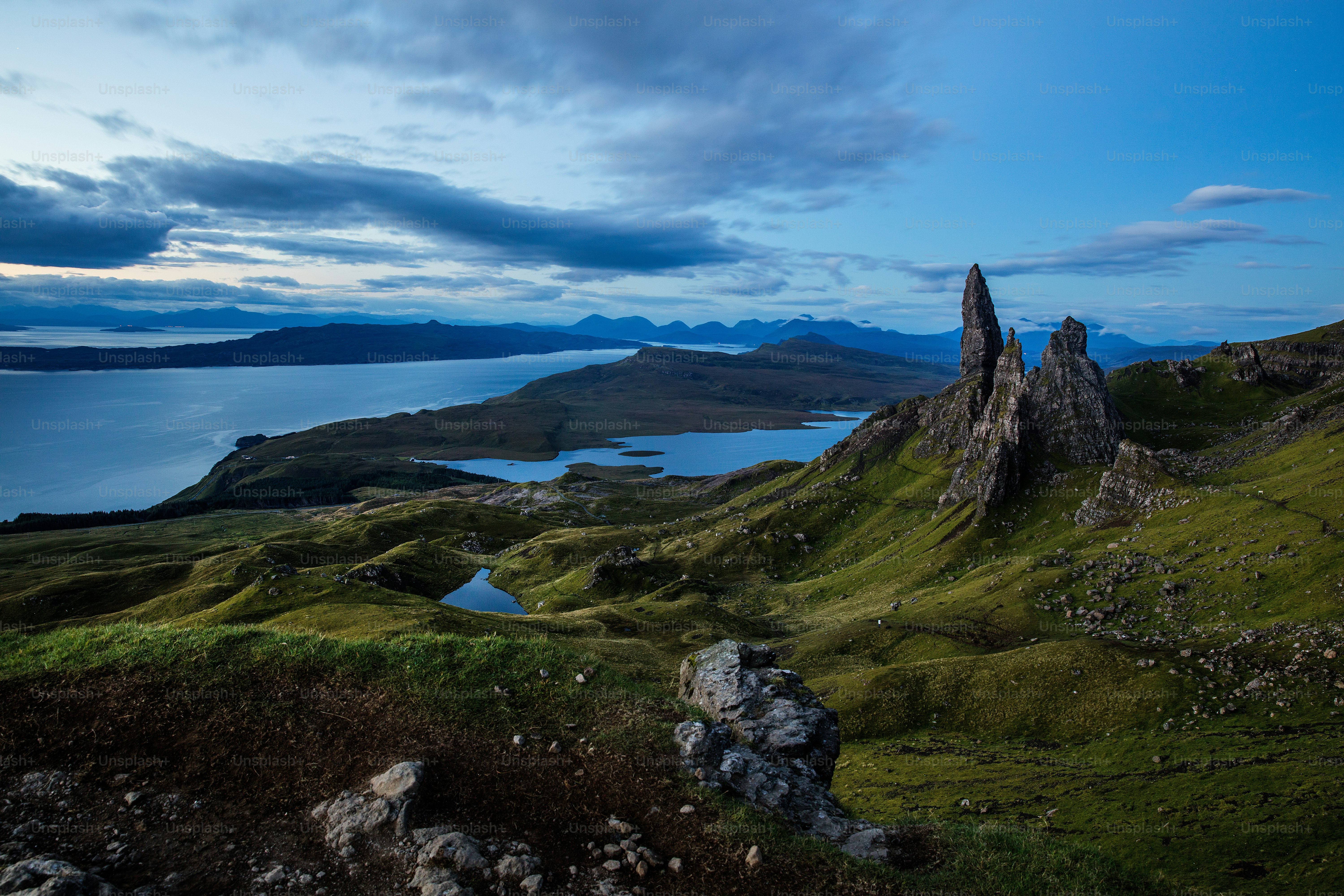 a mountain with a lake in the middle of it