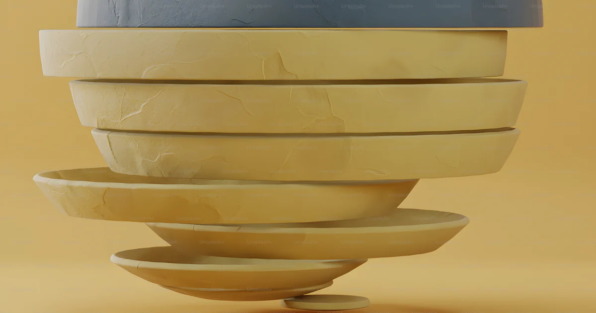 Blue Plates Stack A stack of blue and yellow plates sitting on top of each other photo ...