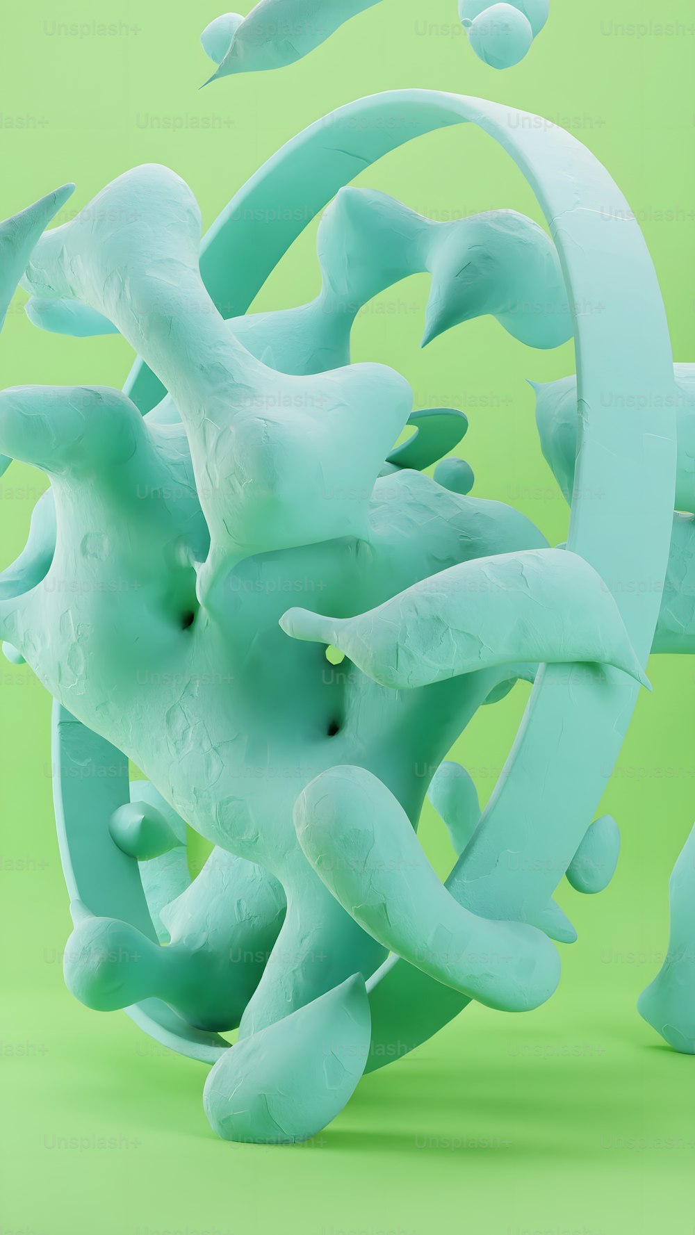 a sculpture made of plastic on a green background