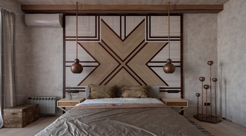 a bedroom with a large bed and a wooden headboard