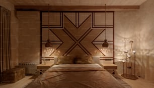 a bed with a wooden head board and lights