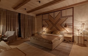 a bedroom with a large bed and a wooden ceiling