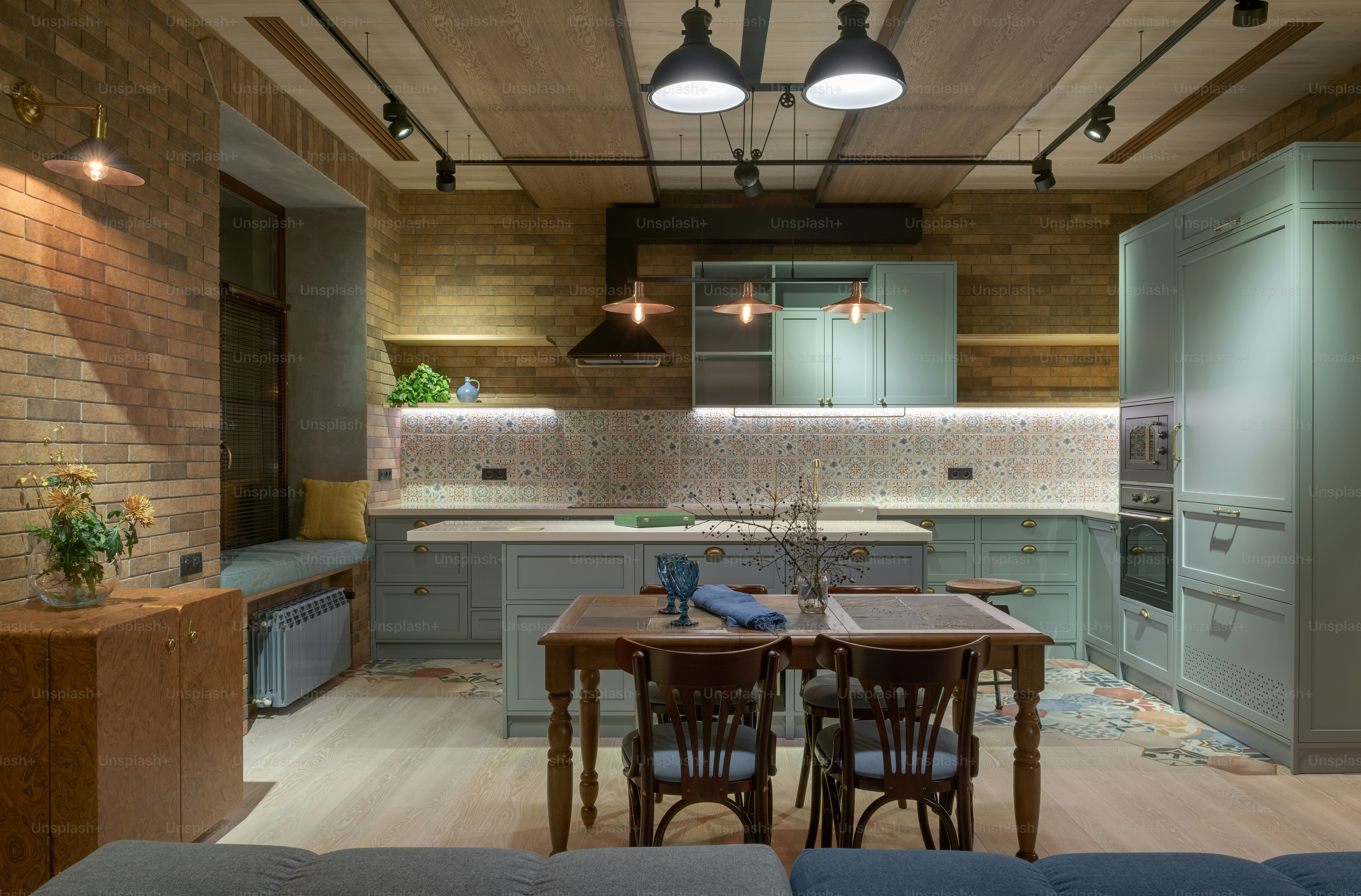 a kitchen with a table and chairs in it