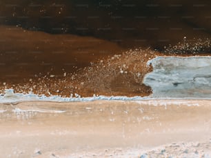 a surfer riding a wave in the ocean