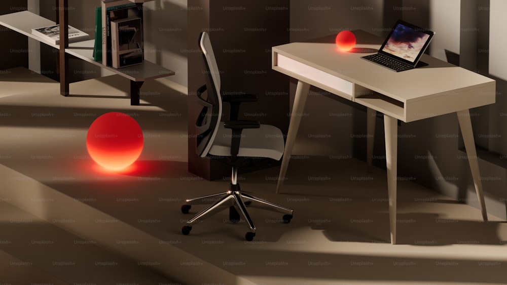a desk with a laptop and a red ball on it