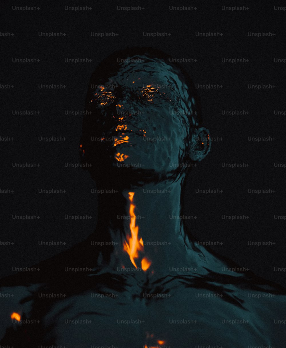 a man's face is covered in fire and water