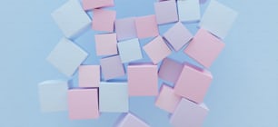 a bunch of pink and blue cubes on a blue background