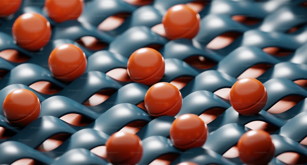 a group of orange and black balls sitting on top of each other