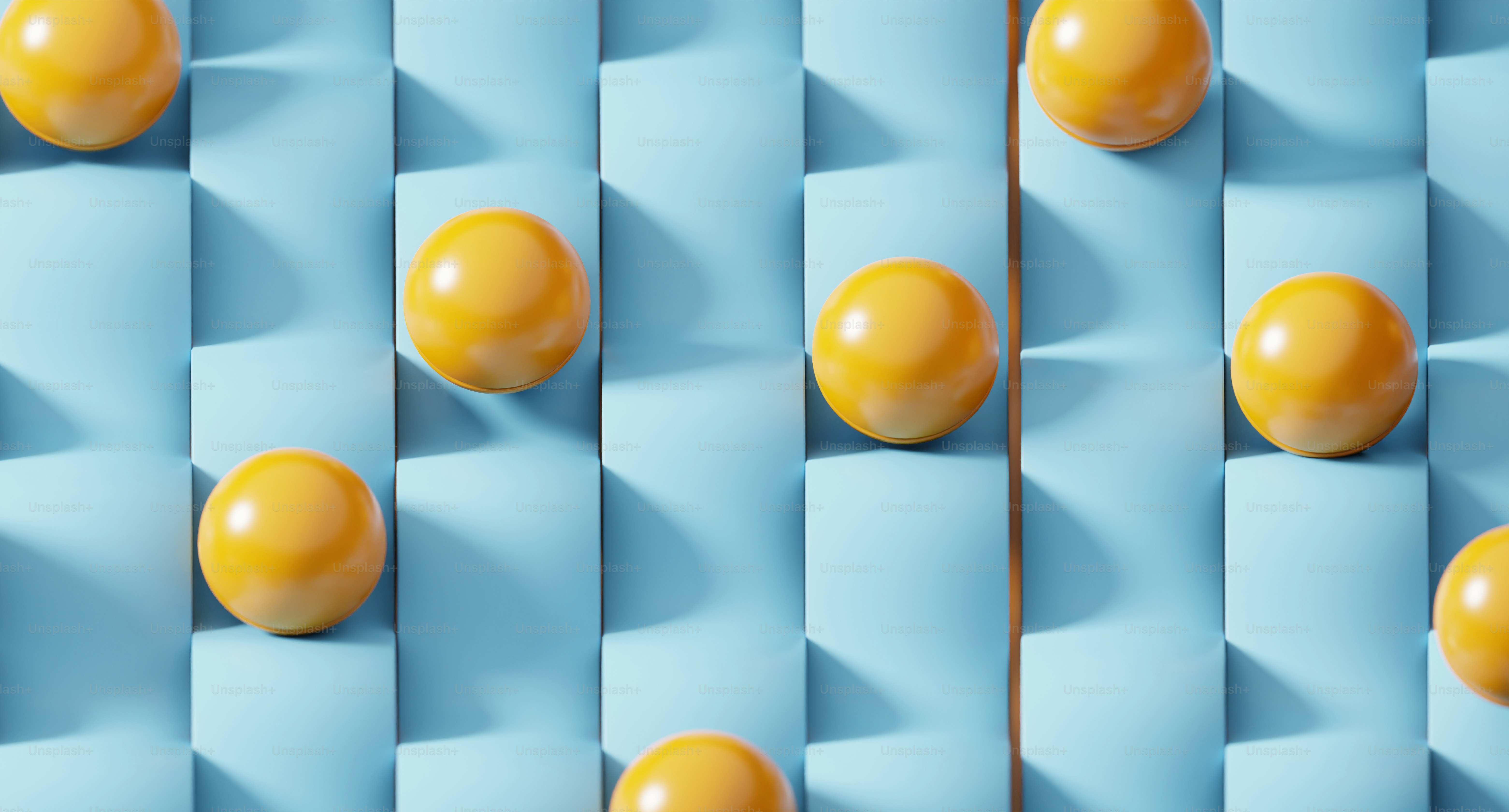 a group of oranges sitting on top of a blue surface