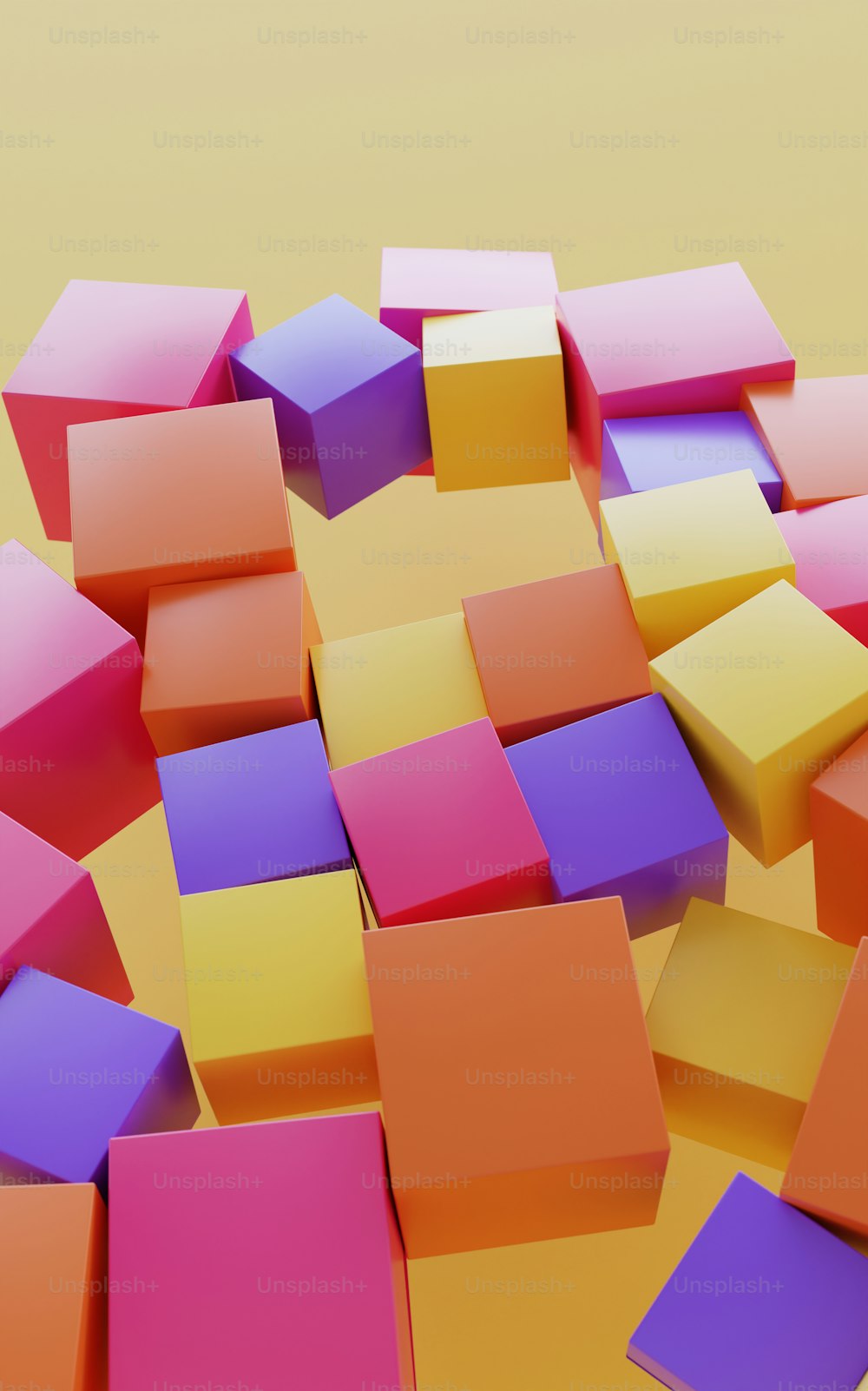 a pile of colorful cubes sitting on top of a table
