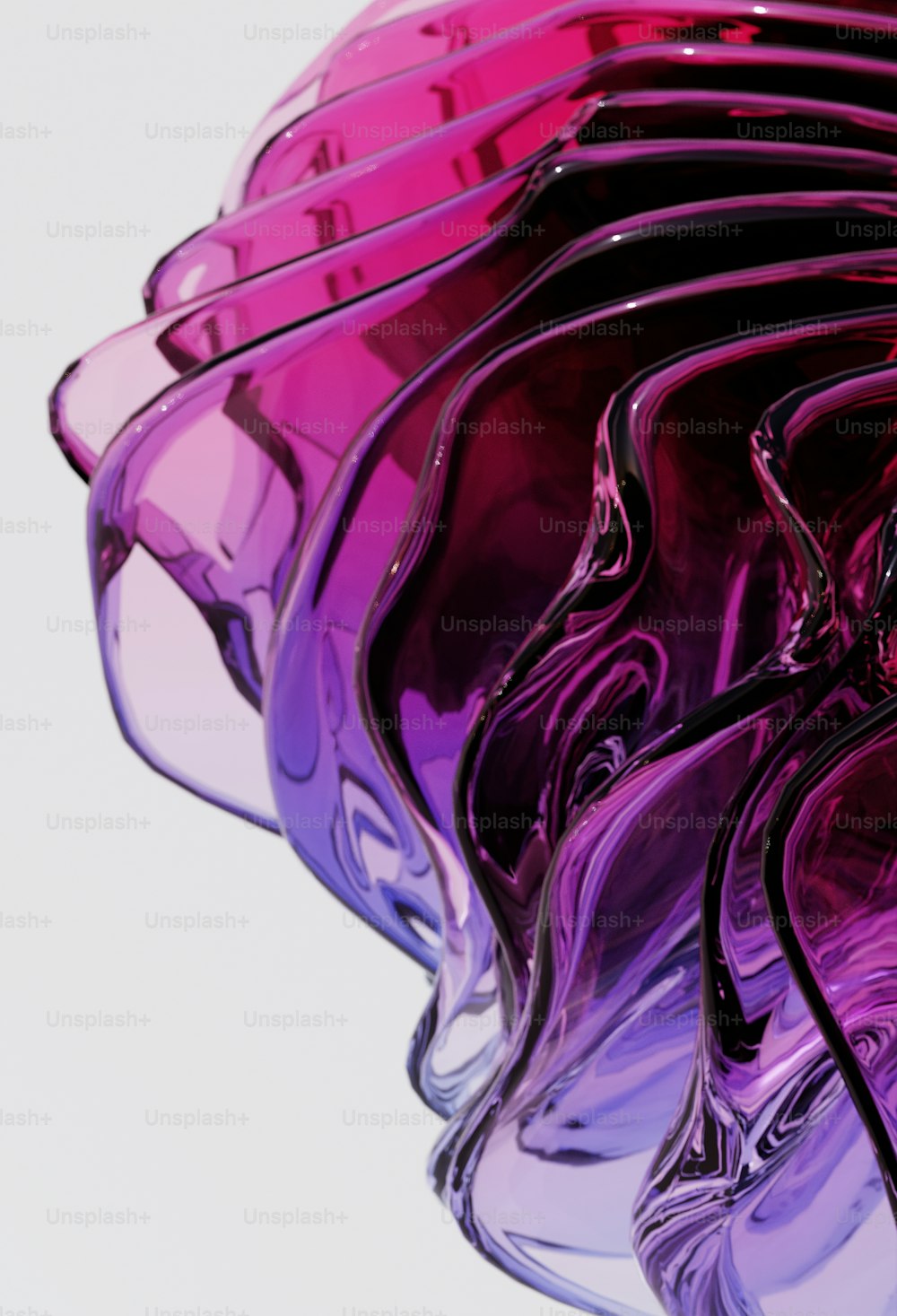 Gros plan d’un vase violet avec un fond blanc