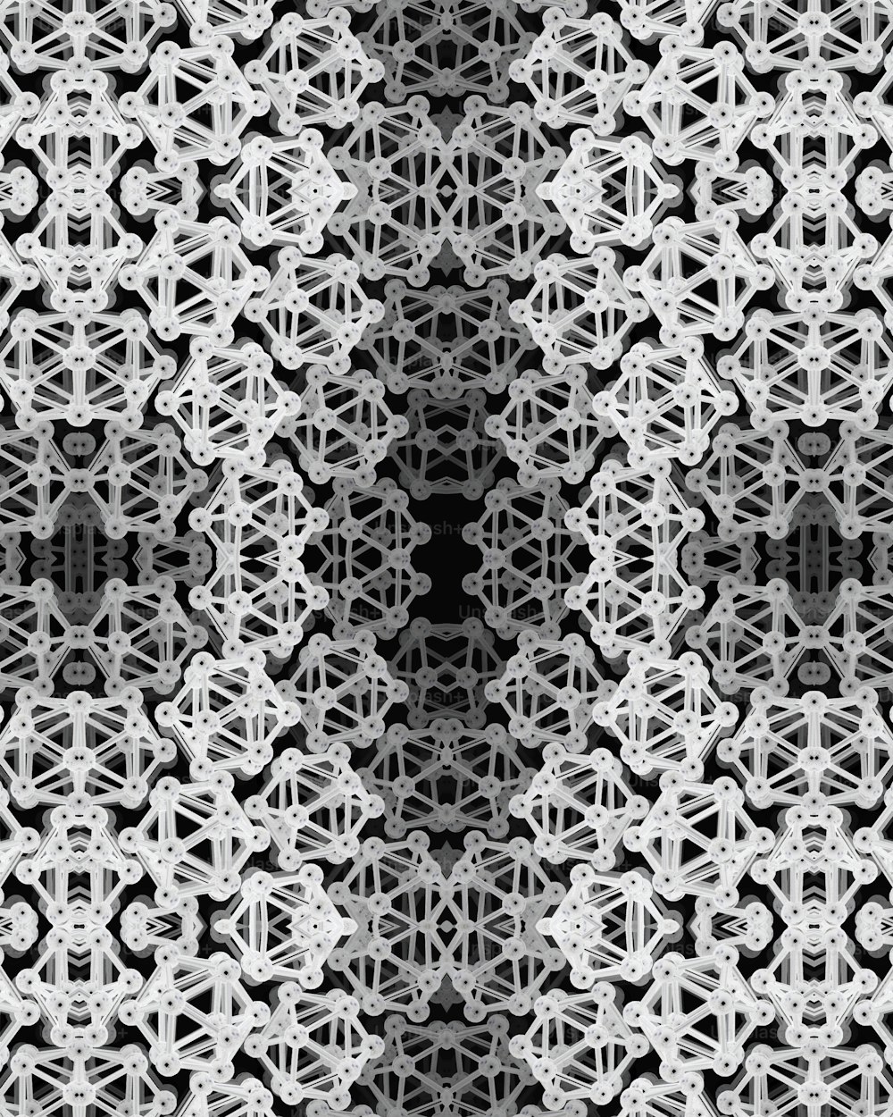 a black and white photo of a pattern