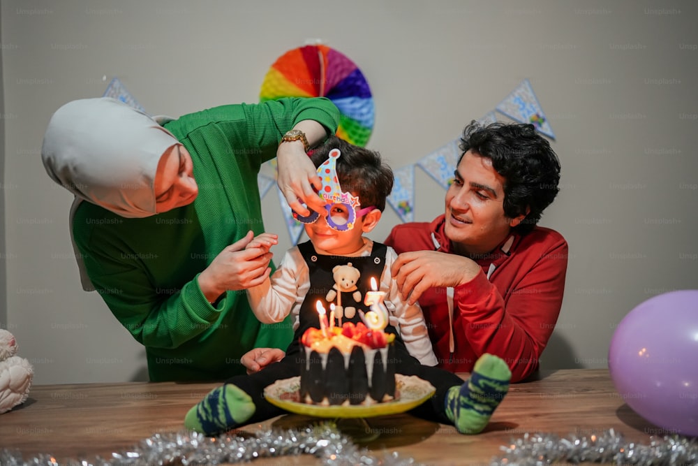 a man and a woman blowing out candles on a cake