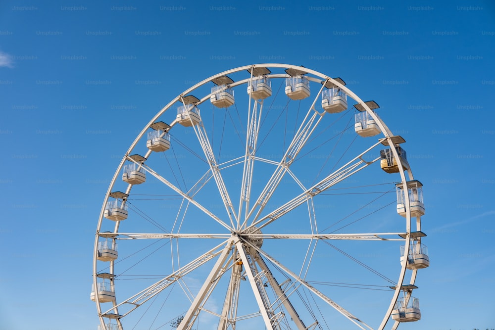 a large ferris wheel on a clear day