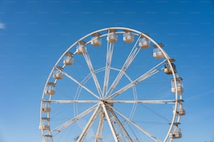 a large ferris wheel on a clear day