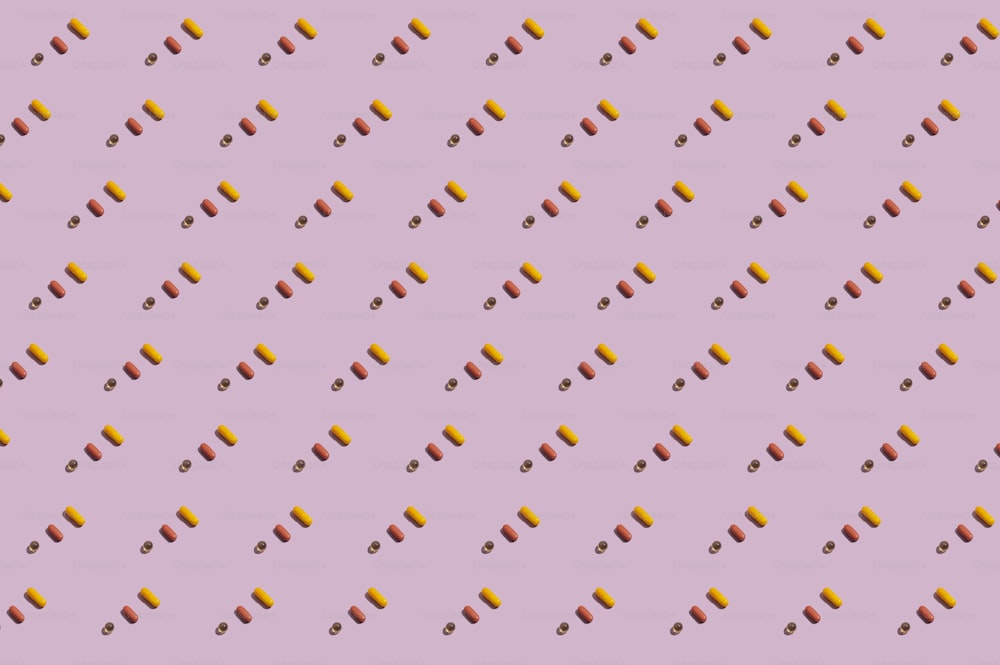 a purple background with orange and red dots