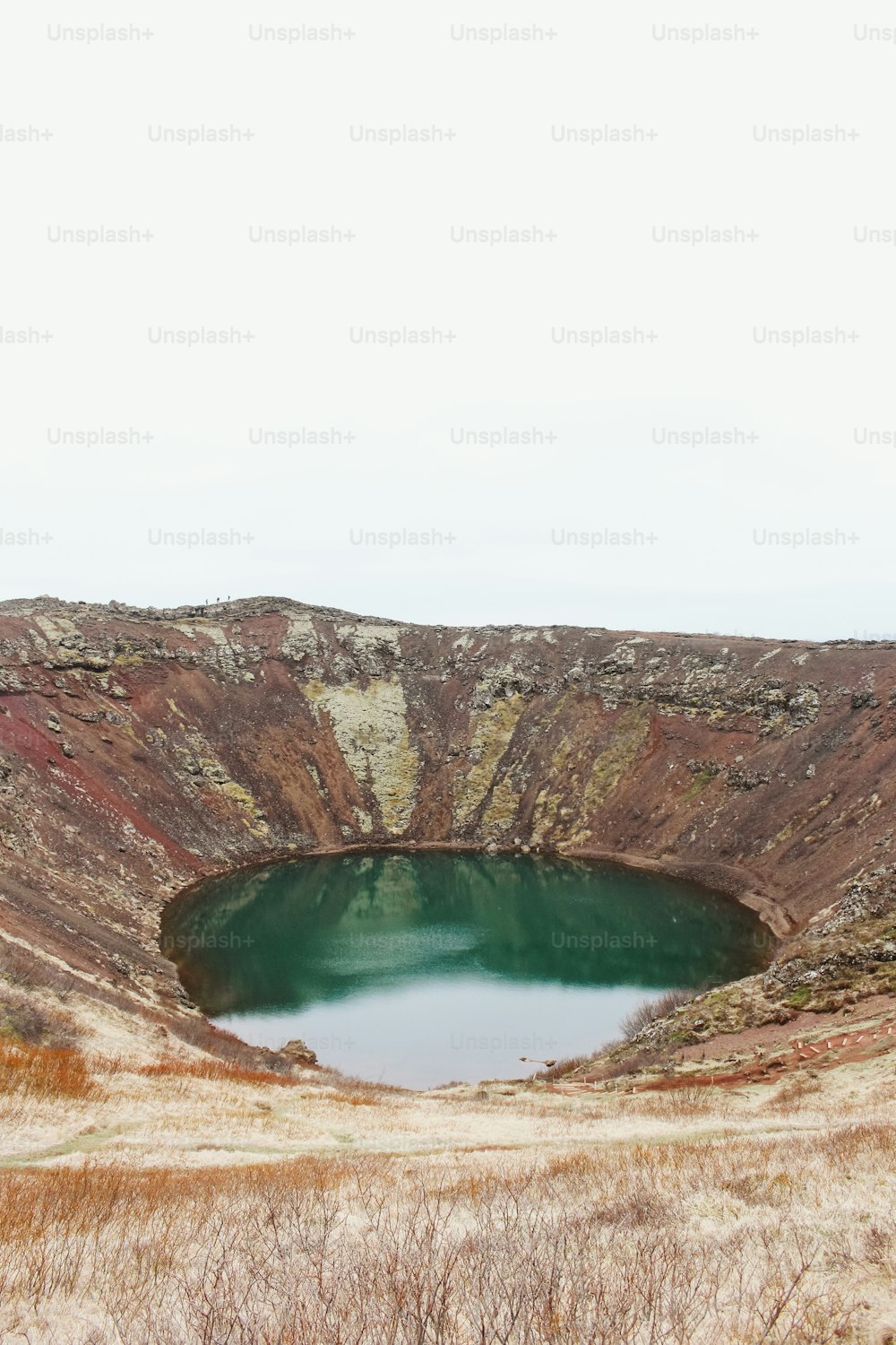 a large crater in the middle of a field