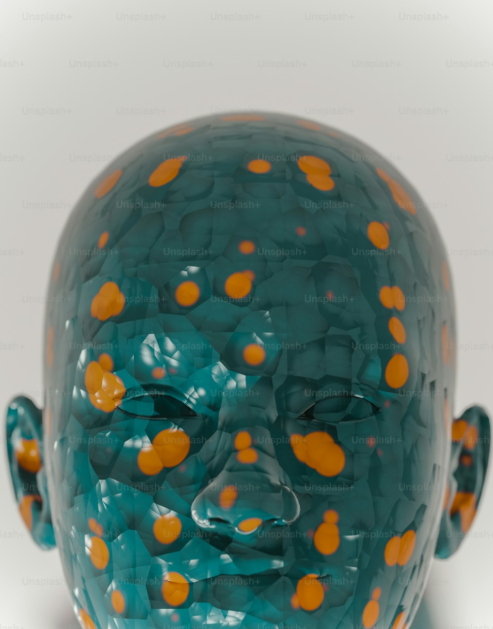 eine blaue Vase mit orangefarbenen Punkten darauf