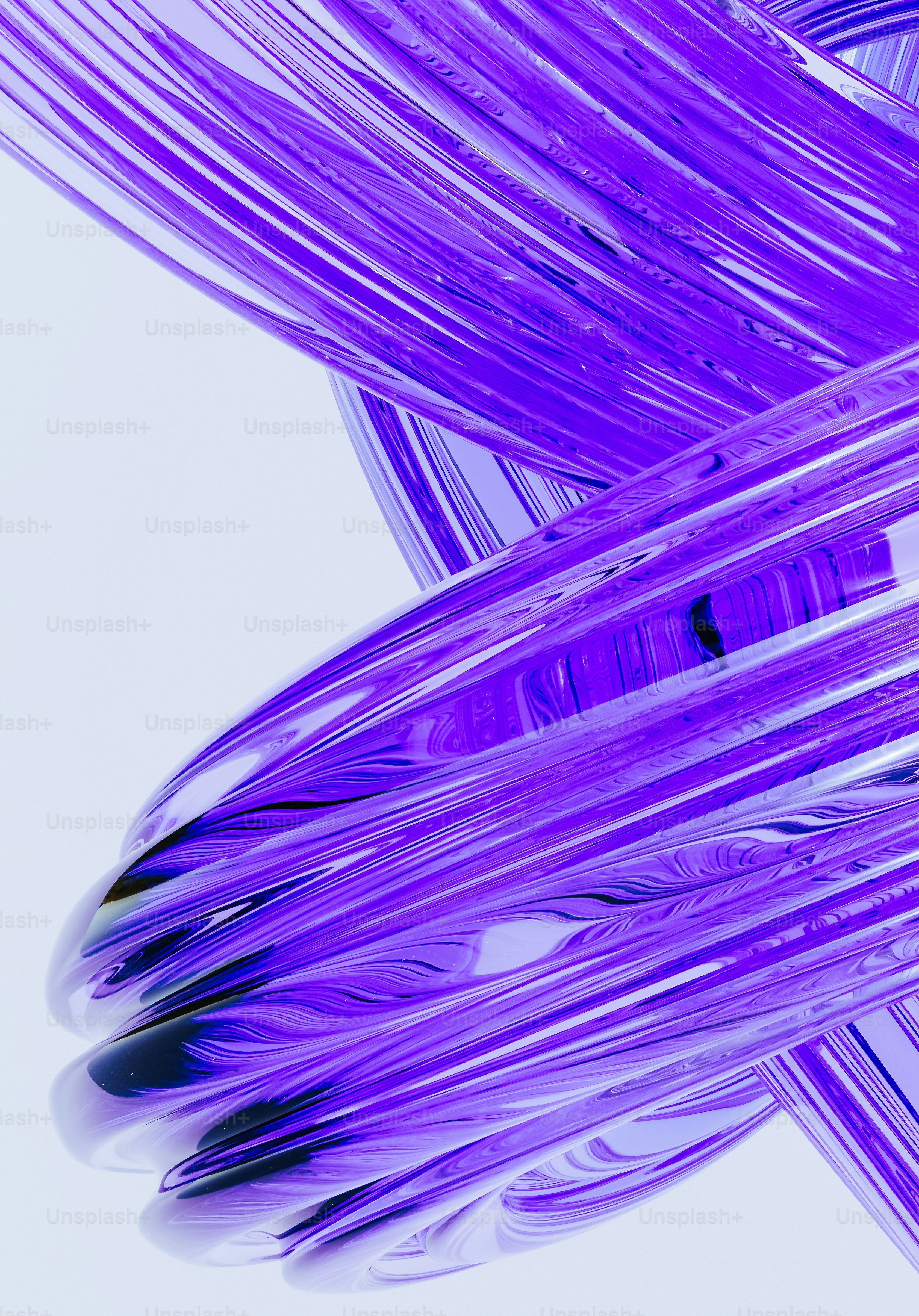 A close up of a purple object on a white background photo – Glass Image ...