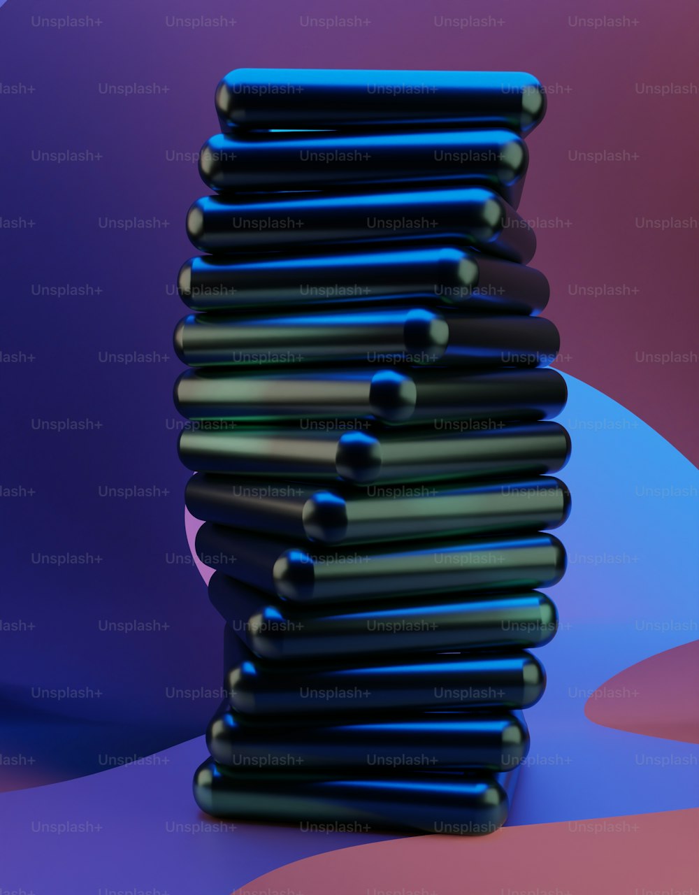 uma pilha de objetos pretos sentados em cima de um fundo roxo e azul