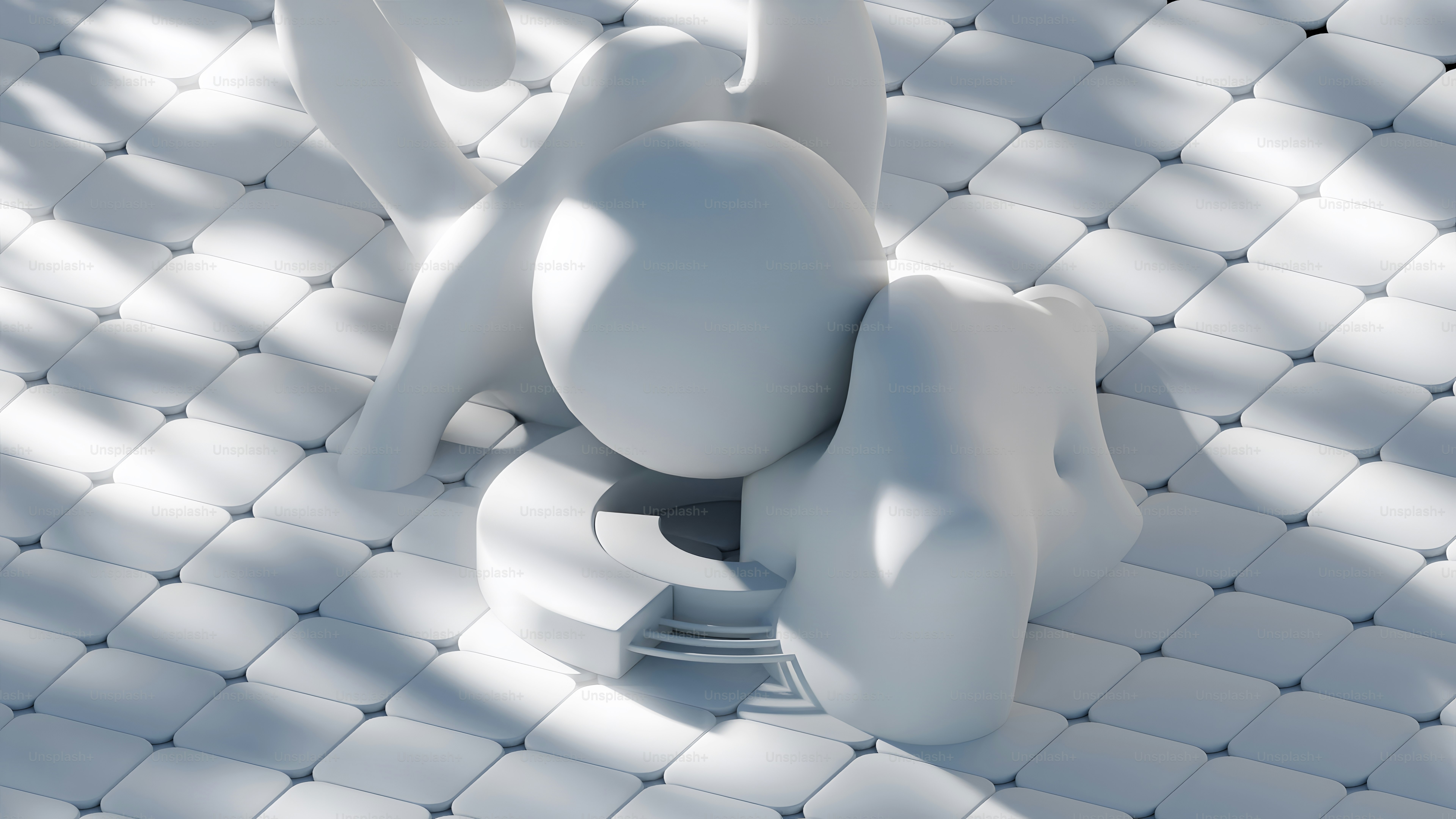 un petit objet blanc assis sur un sol carrelé