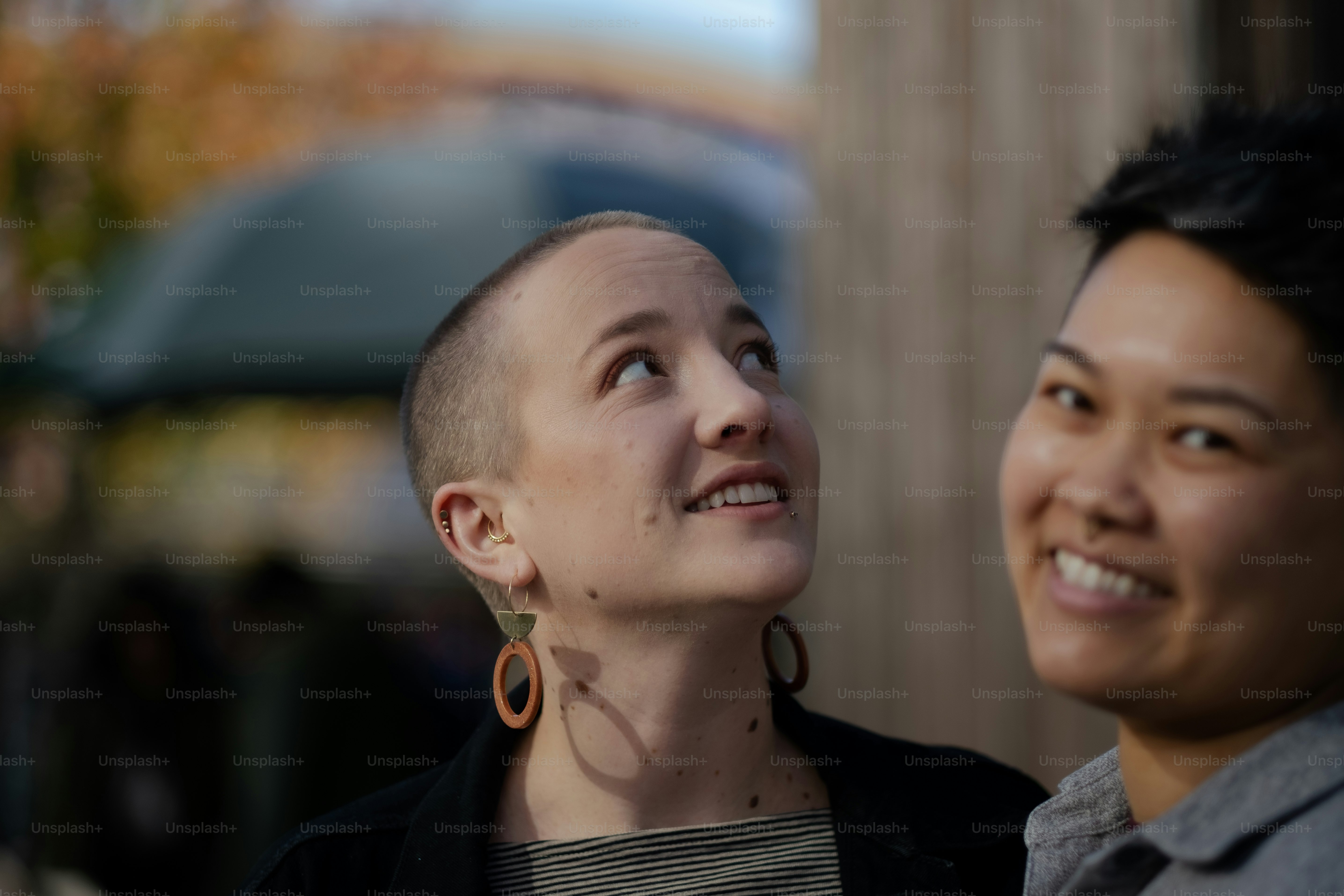 a man and a woman looking up at the sky