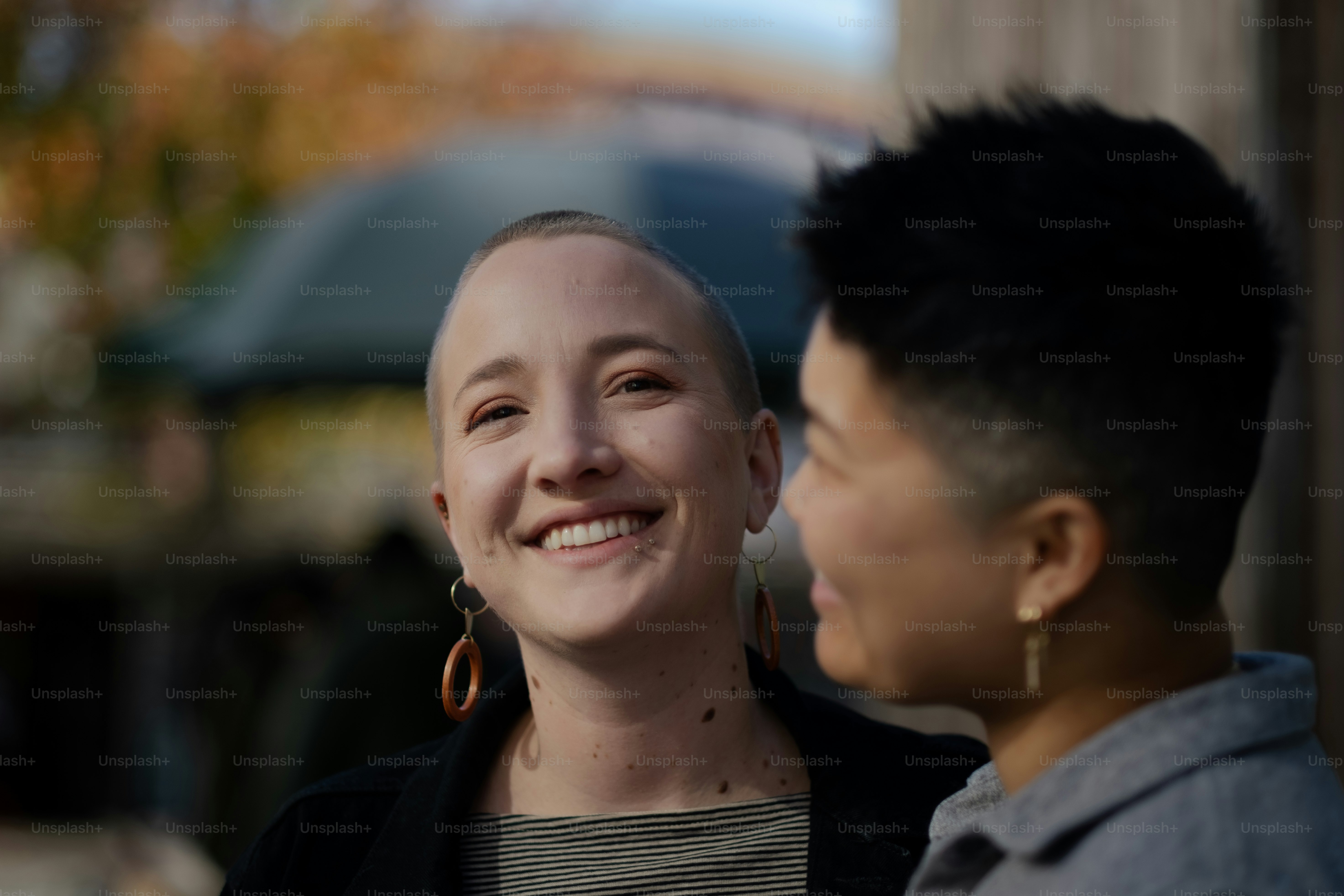 a man and a woman standing next to each other