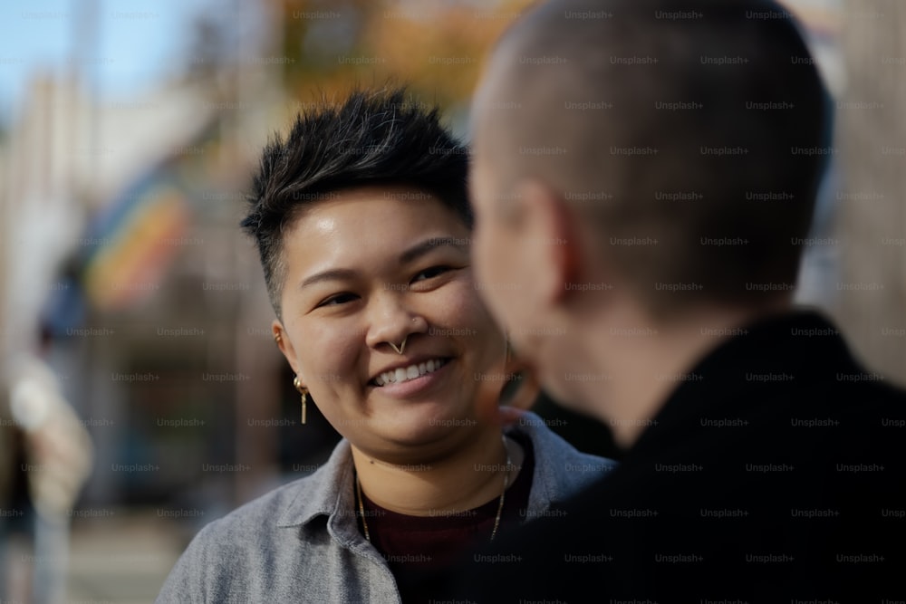 a man and a woman standing next to each other