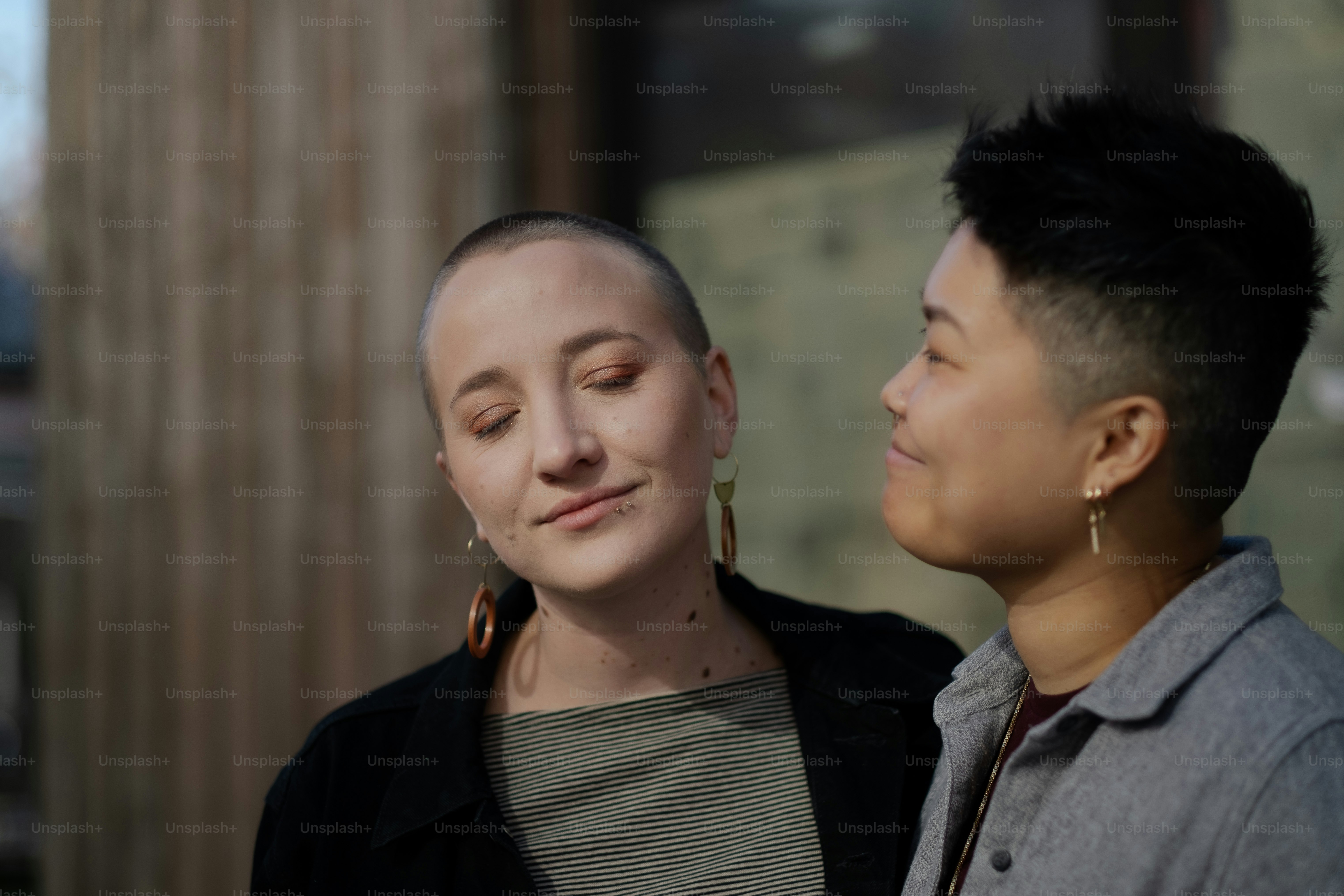 a man and a woman standing next to each other